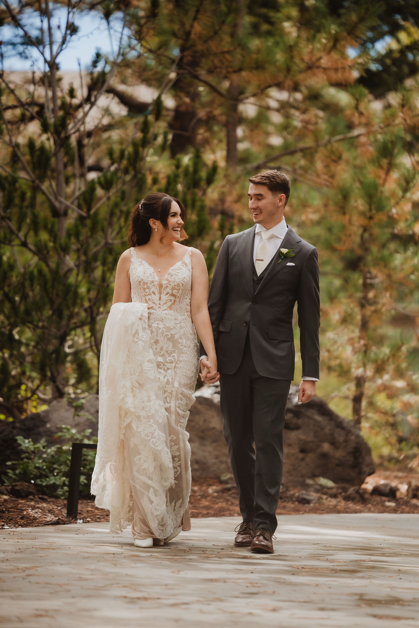 Brittney and Trevor walking through Little America Hotel grounds