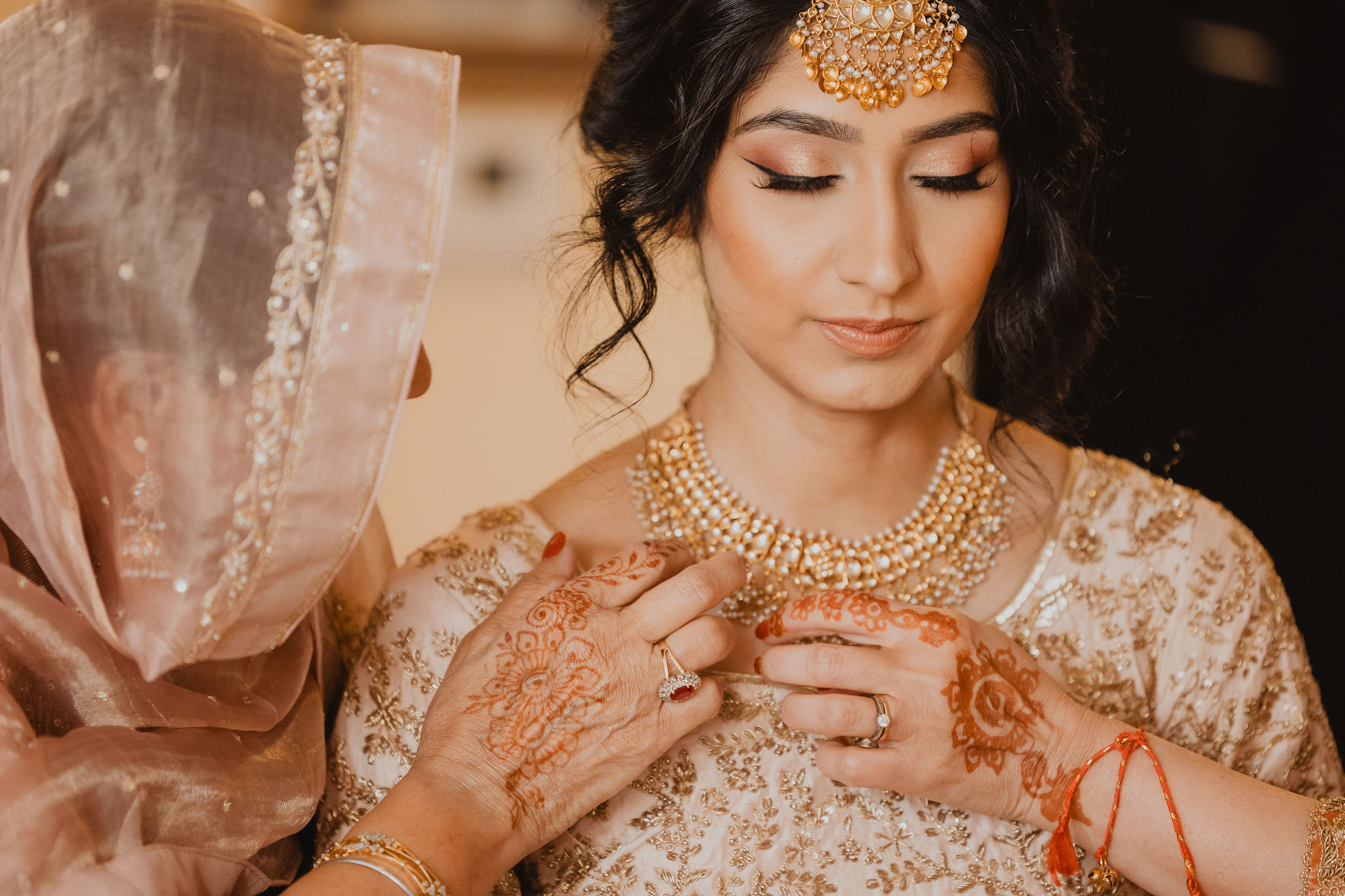 Wedding preparation before the Superstition Mountains ceremony photograph from Amrit and Yousef’s wedding celebration