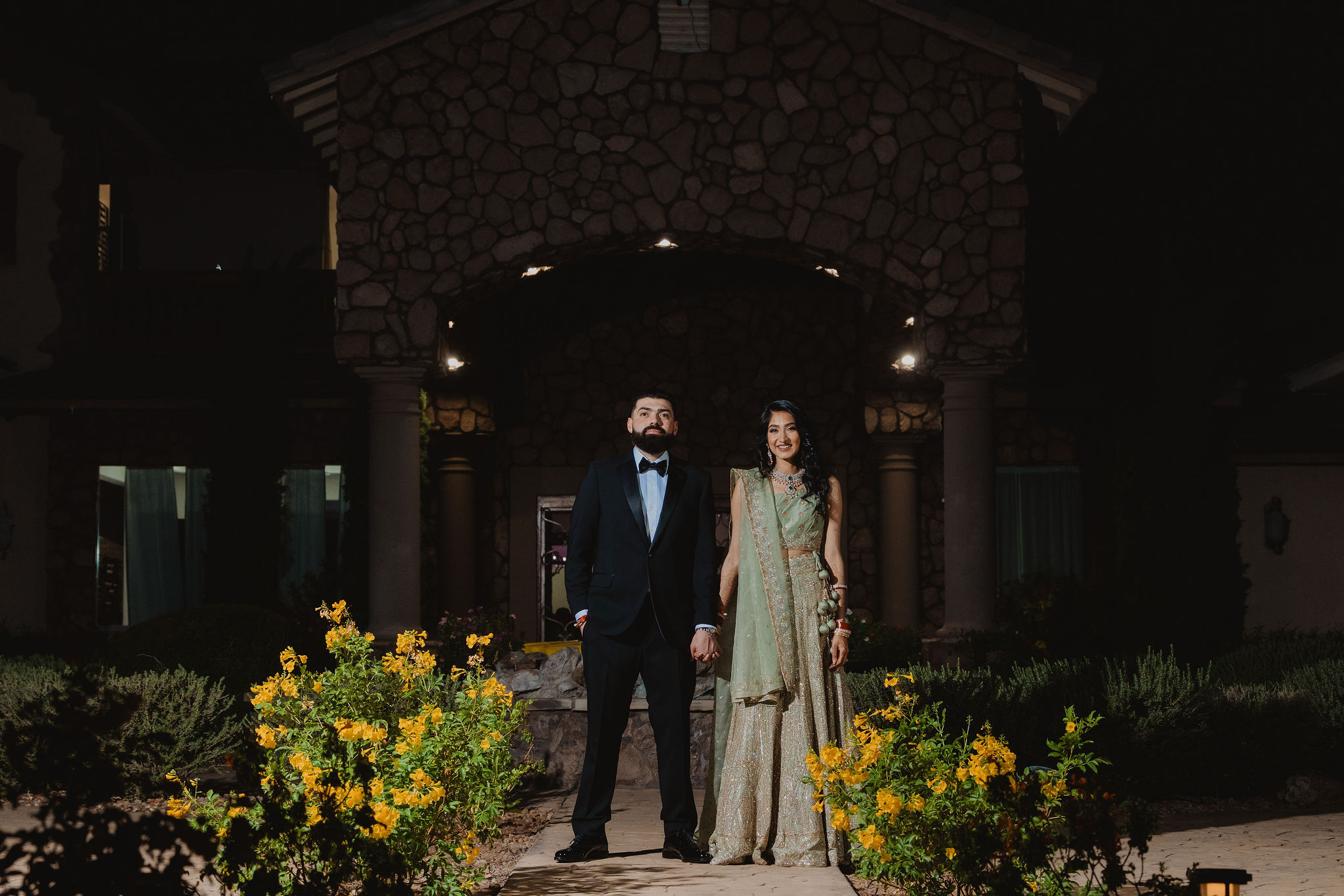 Amrit and Yousef in a night portrait after their wedding reception