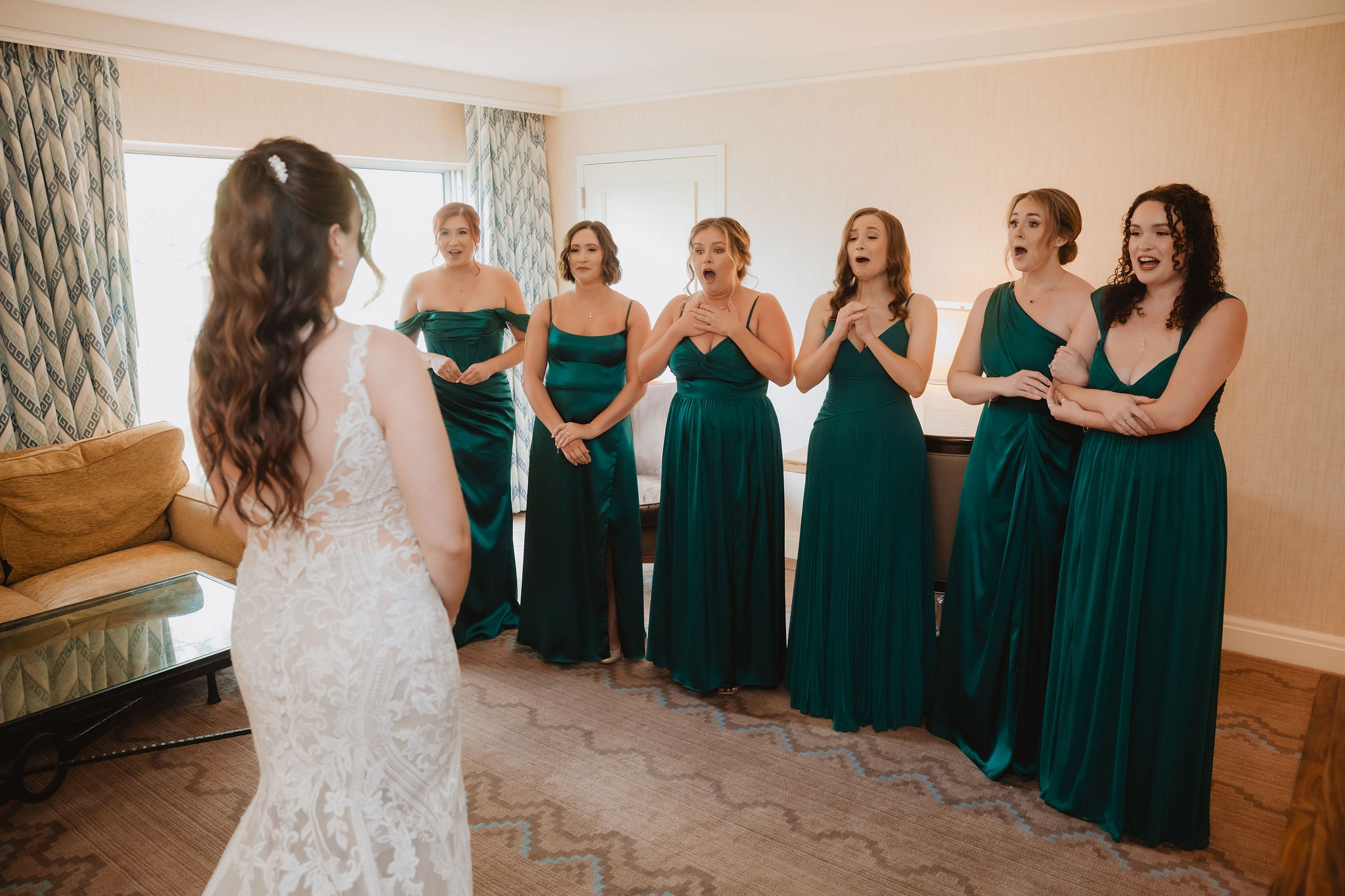 Bridesmaids reacting as Brittney gets ready