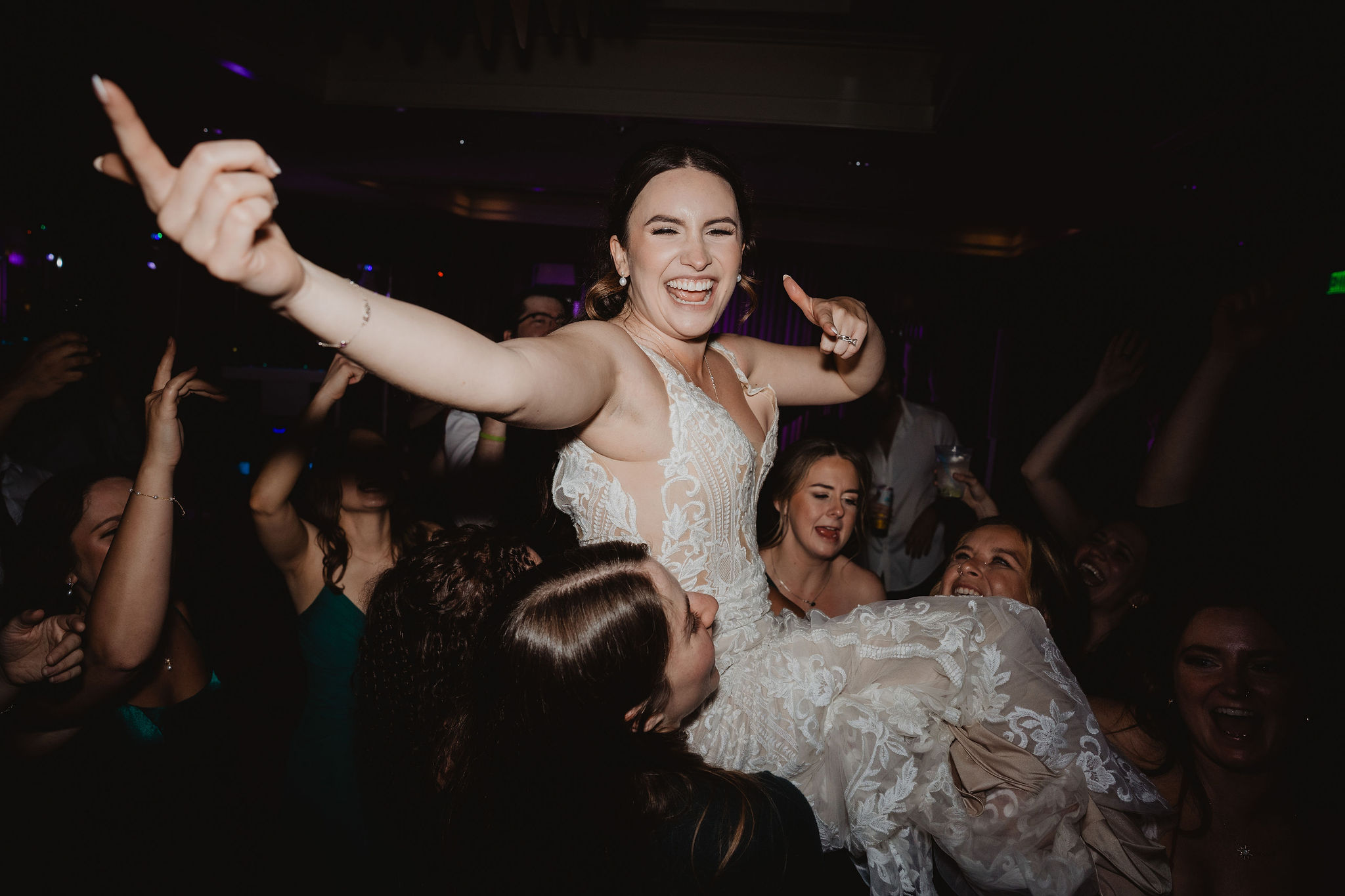 Brittney being carried on the dance floor